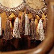 Lampshade with bannister in foreground